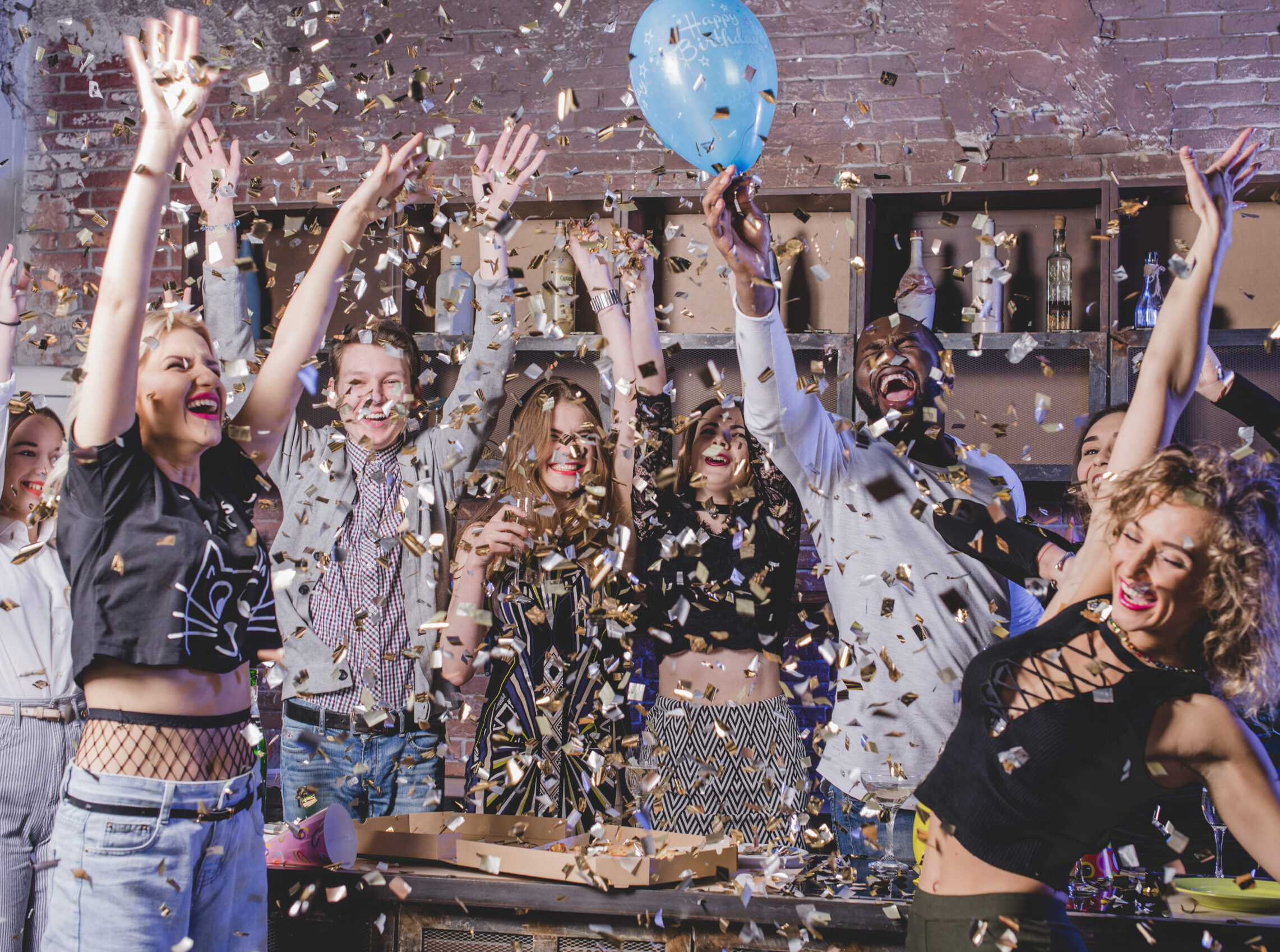 celebrating-group-friends-scaled-e1775977778469.jpg
